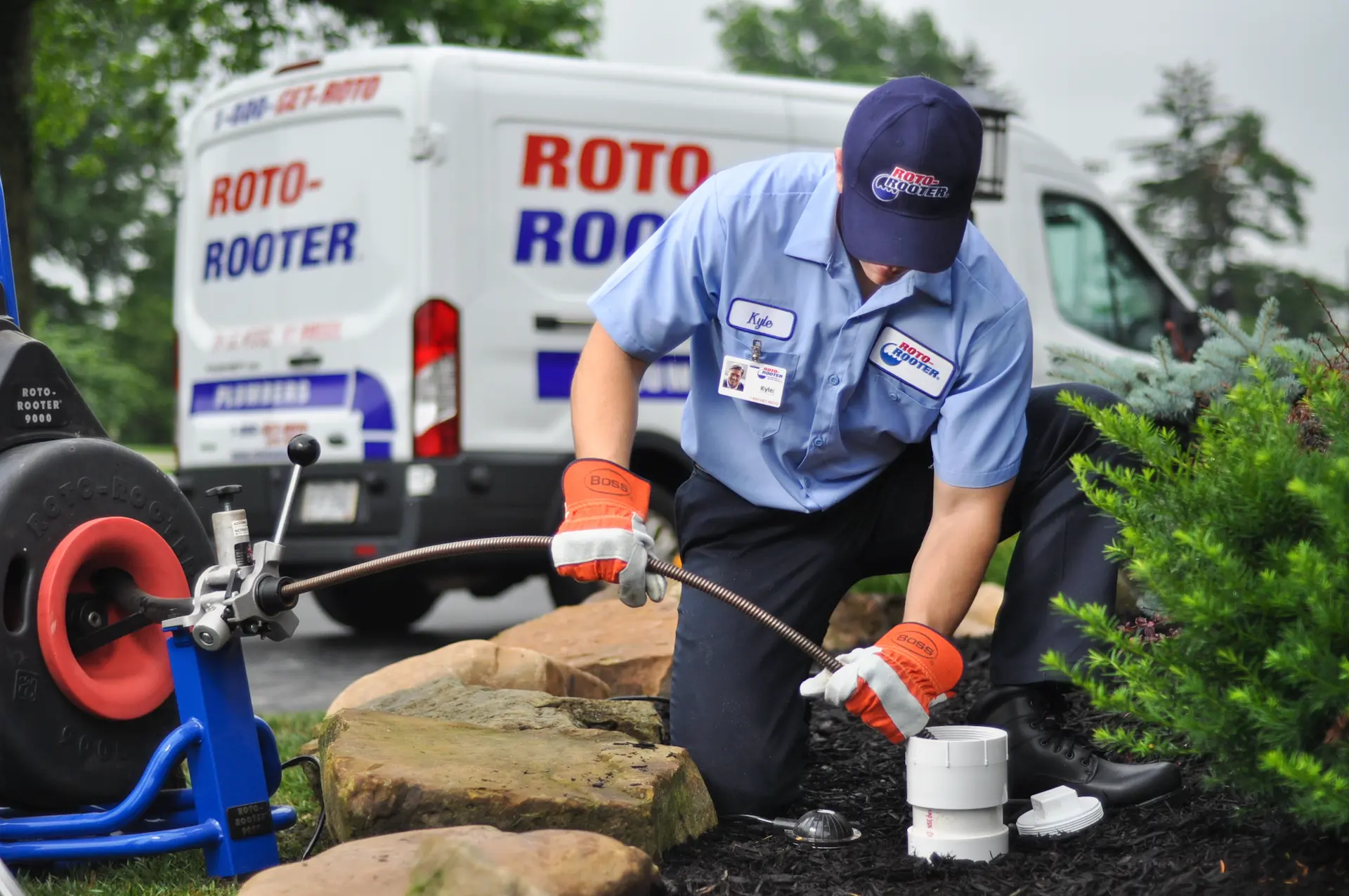 Roto-Rooter technician clearing a clogged drain in an Apple Valley home